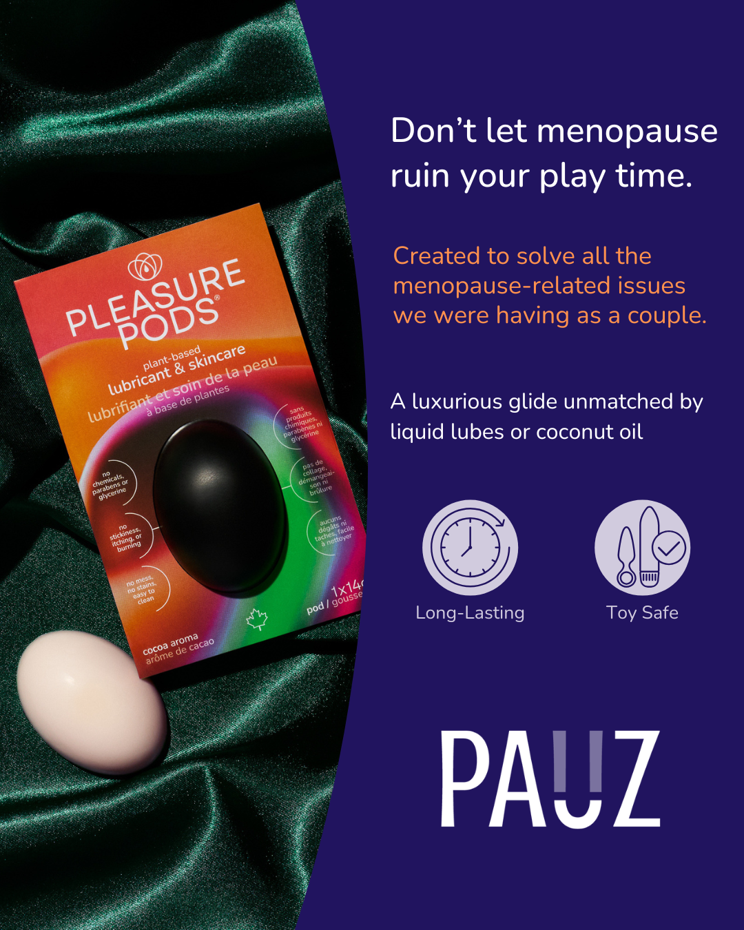 Two pleasure pods, one black and one white on top of a green satin fabric.