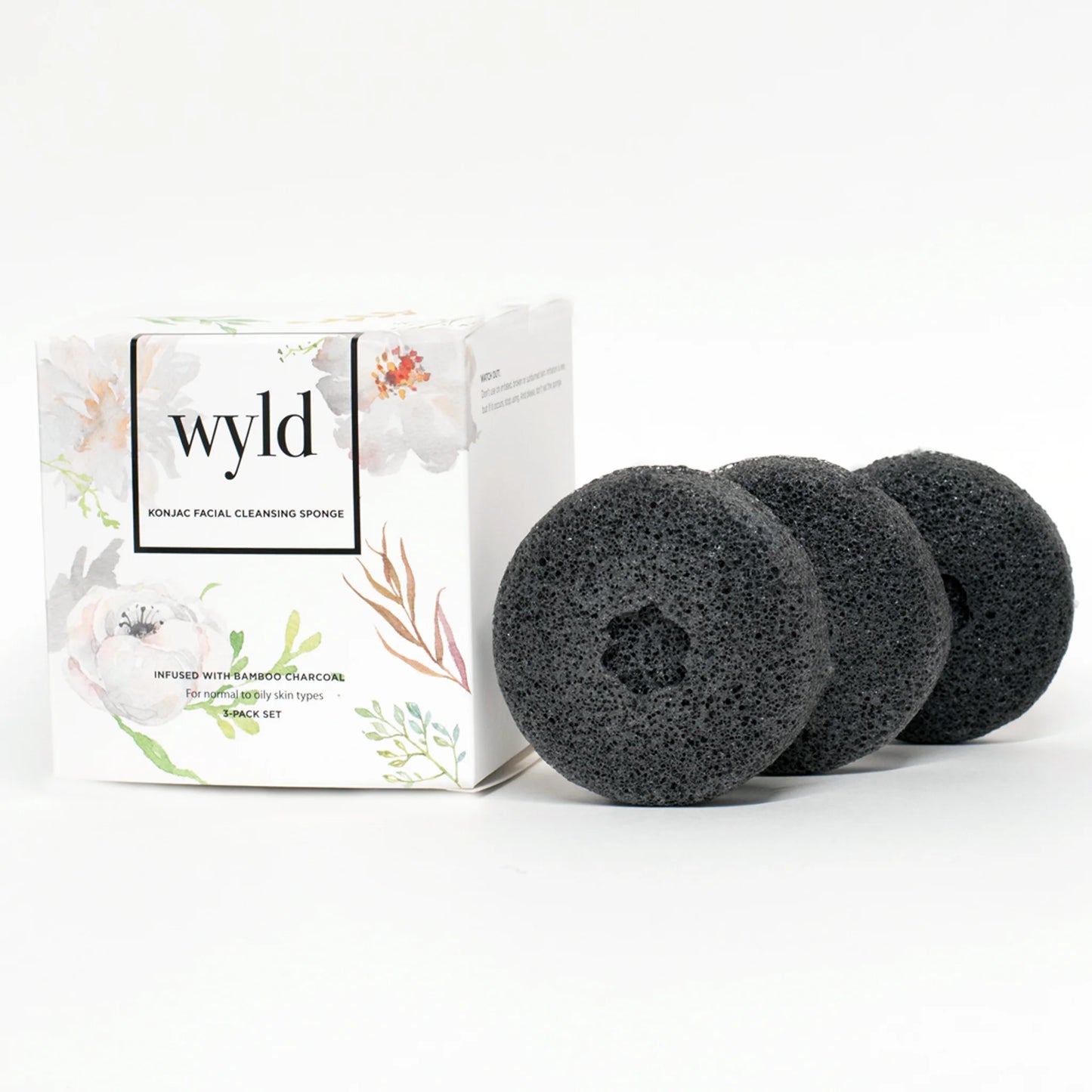 Three black konjac facial sponges.